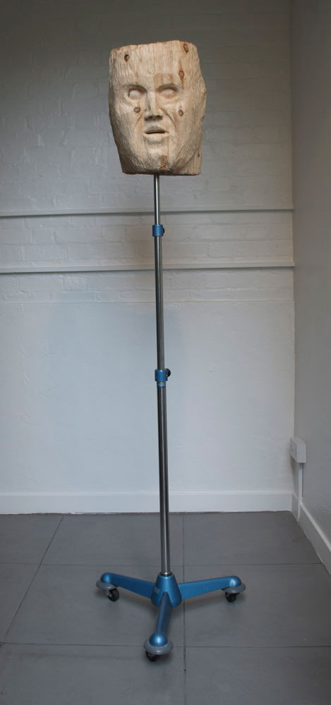 Alan Currall 'I am too complex, adaptive, apparently purposeful and beautiful to have occurred randomly or accidently', 2009, pine, light-stand, microcontroller, speech synthesier-speakers, battery