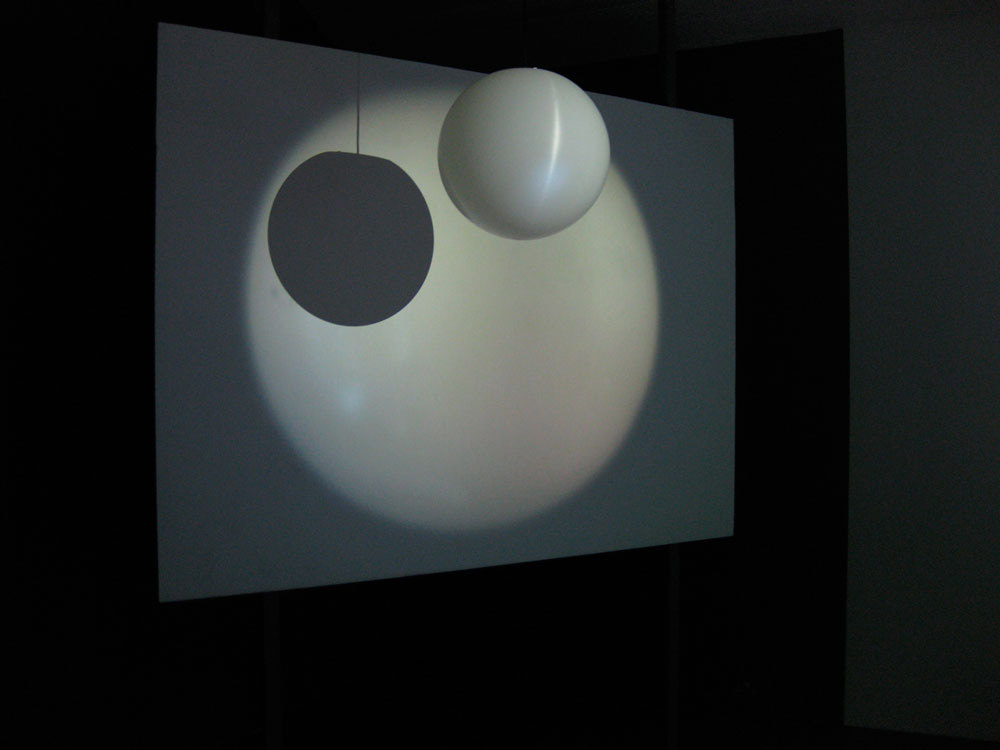 Kim Coleman & Jenny Hogarth 'Museum Light', 2008, looped digital film on dvd, globe pendant shape