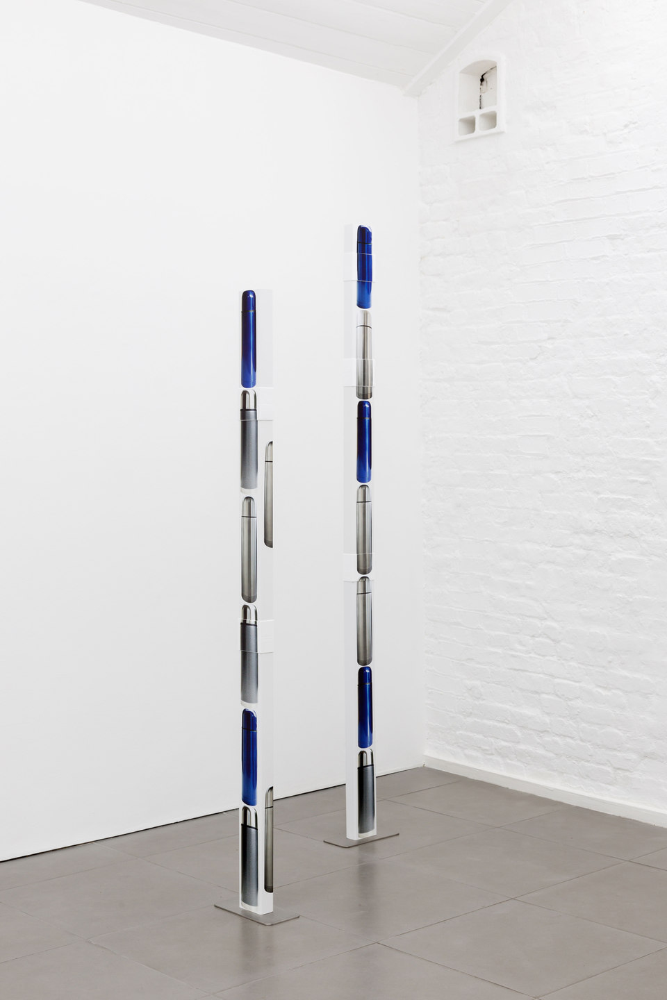 Marte Eknæs, Reboot Horizon, 'Arranged for Effect (column) I', 2012, ventilation tubes with stickers, steel foot, Cell Project Space