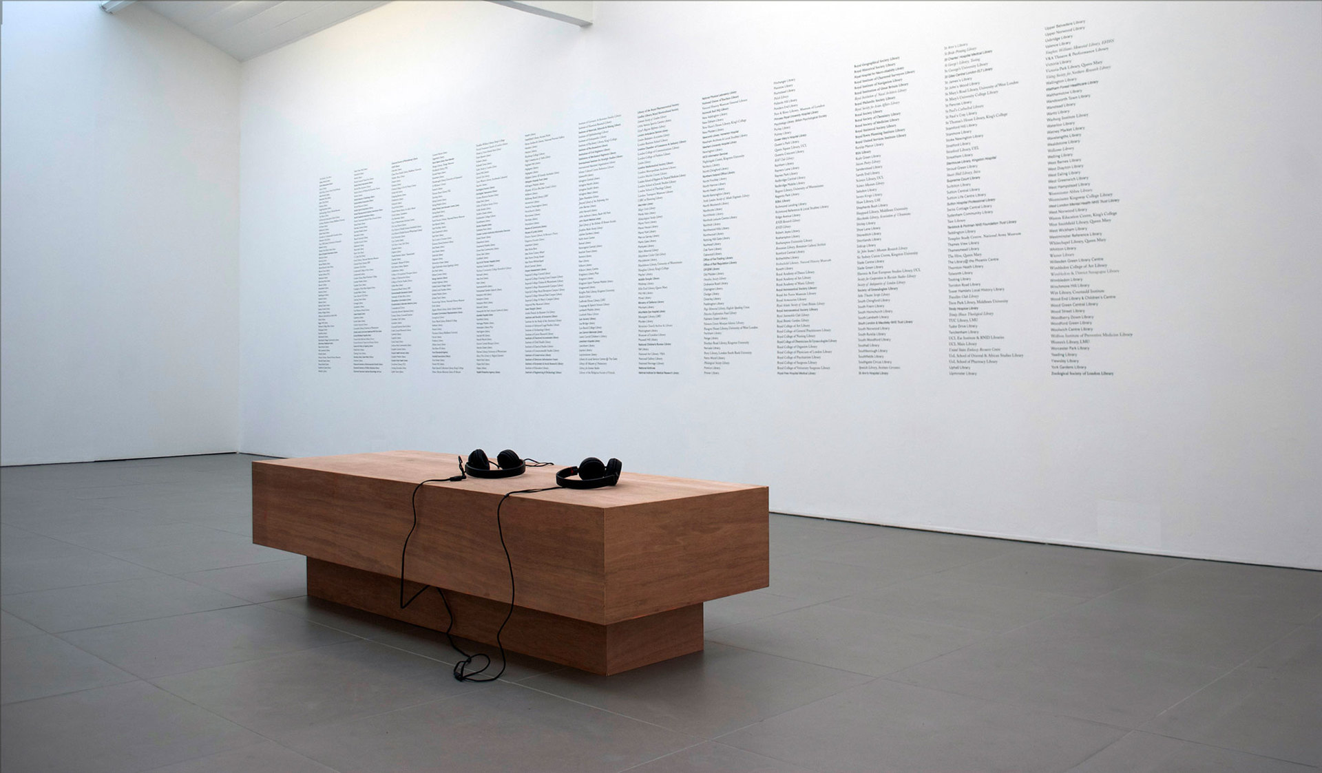 Ruth Beale, Now from Now, 2011, plywood, foam, fabric, headphones, audio on mp3, duration 9 min., library books from a selection of public libraries in london (58 x 160 cm), Cell Project Space