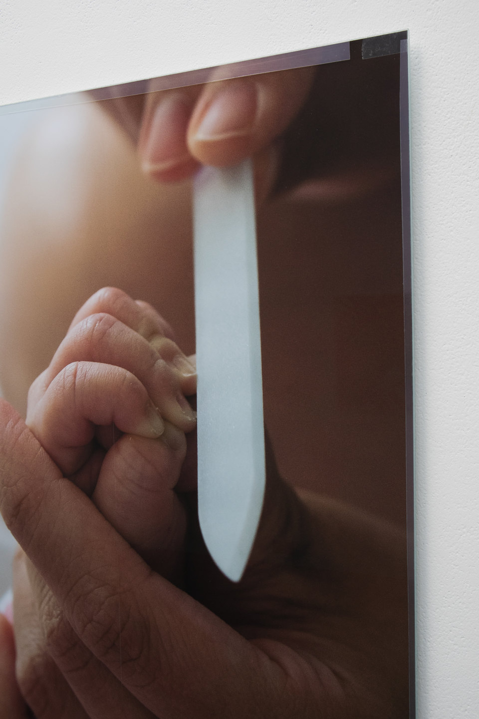 Niklas Taleb, Untitled, detail, 2023, archival pigment print, artist frame; glass, tape Niklas Taleb, Untitled, detail, 2023, archival pigment print, artist frame; glass, tape