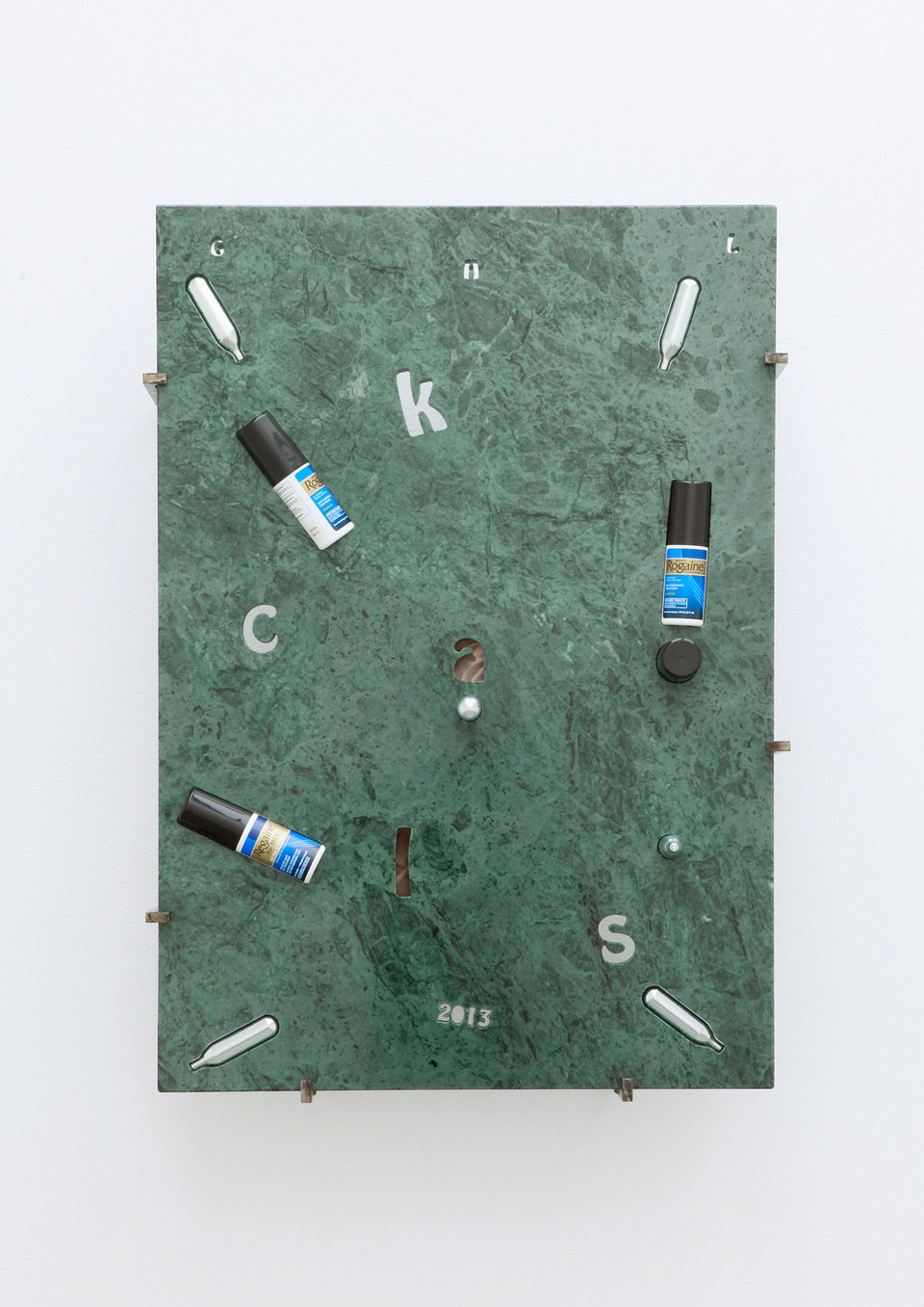 George Henry Longly, 2013: Year of the Snake, 2013 George Henry Longly, 2013: Year of the Snake, 2013, Verde Guatamala marble, whipping cream, chargers (nitrous oxide / laughing gas), Regaine (UK), Rogaine (US), Manifique (gay magazine), steel stand off fixings, 57 x 82 x 18 cm, Cell Project Space