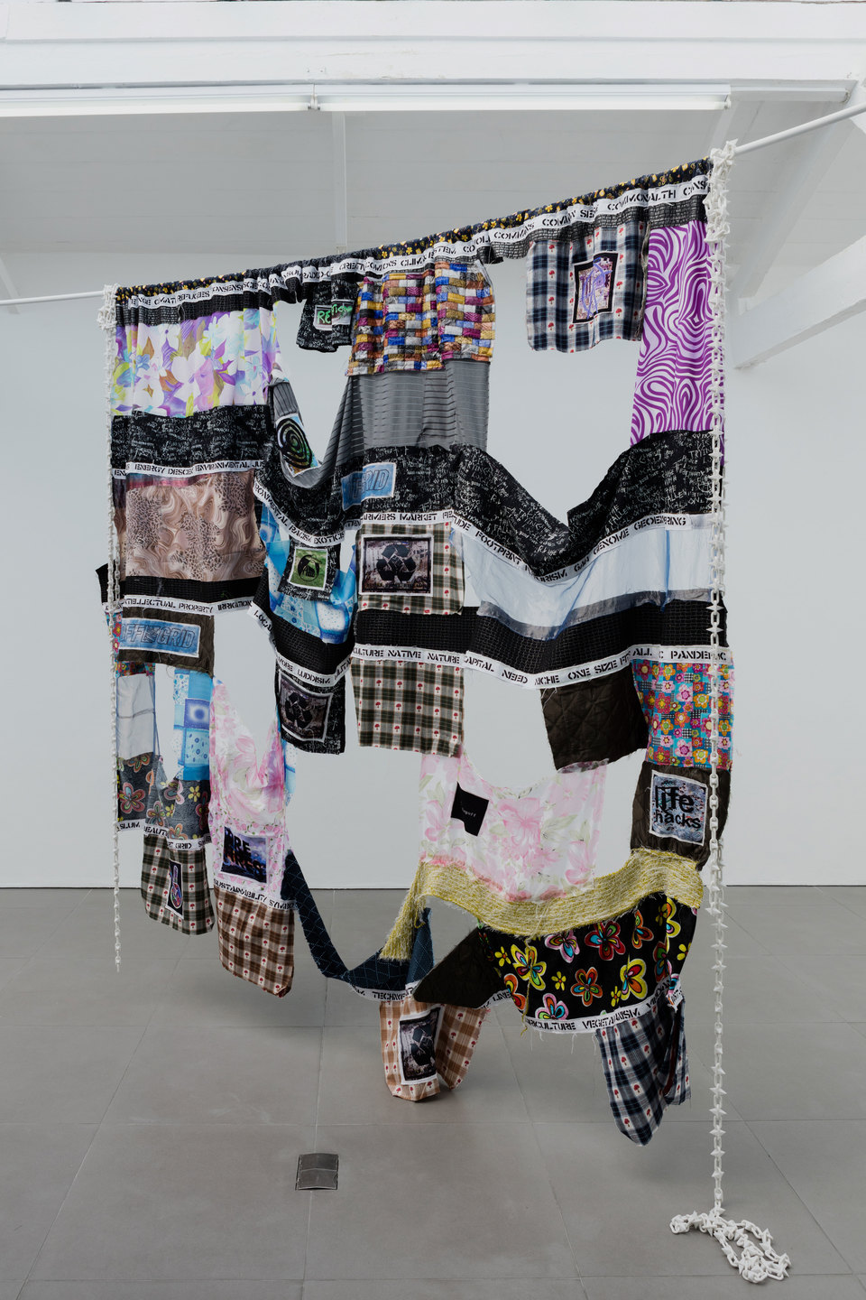 Leslie Kulesh, Anthropo-scenester, 2016, digital print, mixed media ( 4500mm x 240mm). Cell Project space