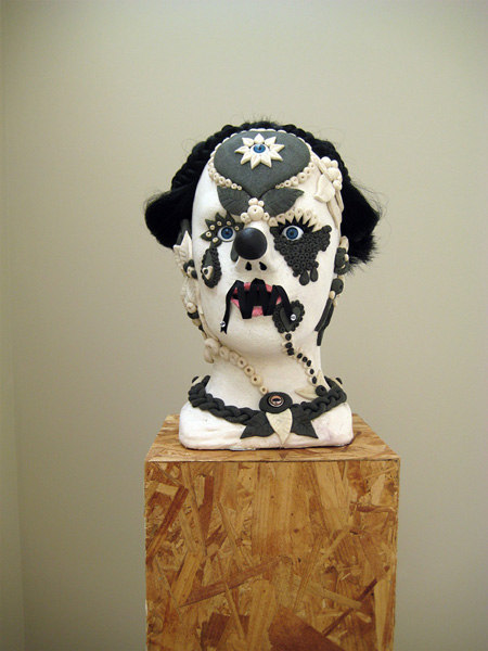 Jonathan Baldock, Adriana  2007 Jonathan Baldock, Adriana  2007  Salt-dough, pins,ribbon, dolls eyes, polystyrene, colouring, paint, synthetic hair  22 x 34 x 34cm plinth: 134 x 24 x 24 cm Cell Project Space