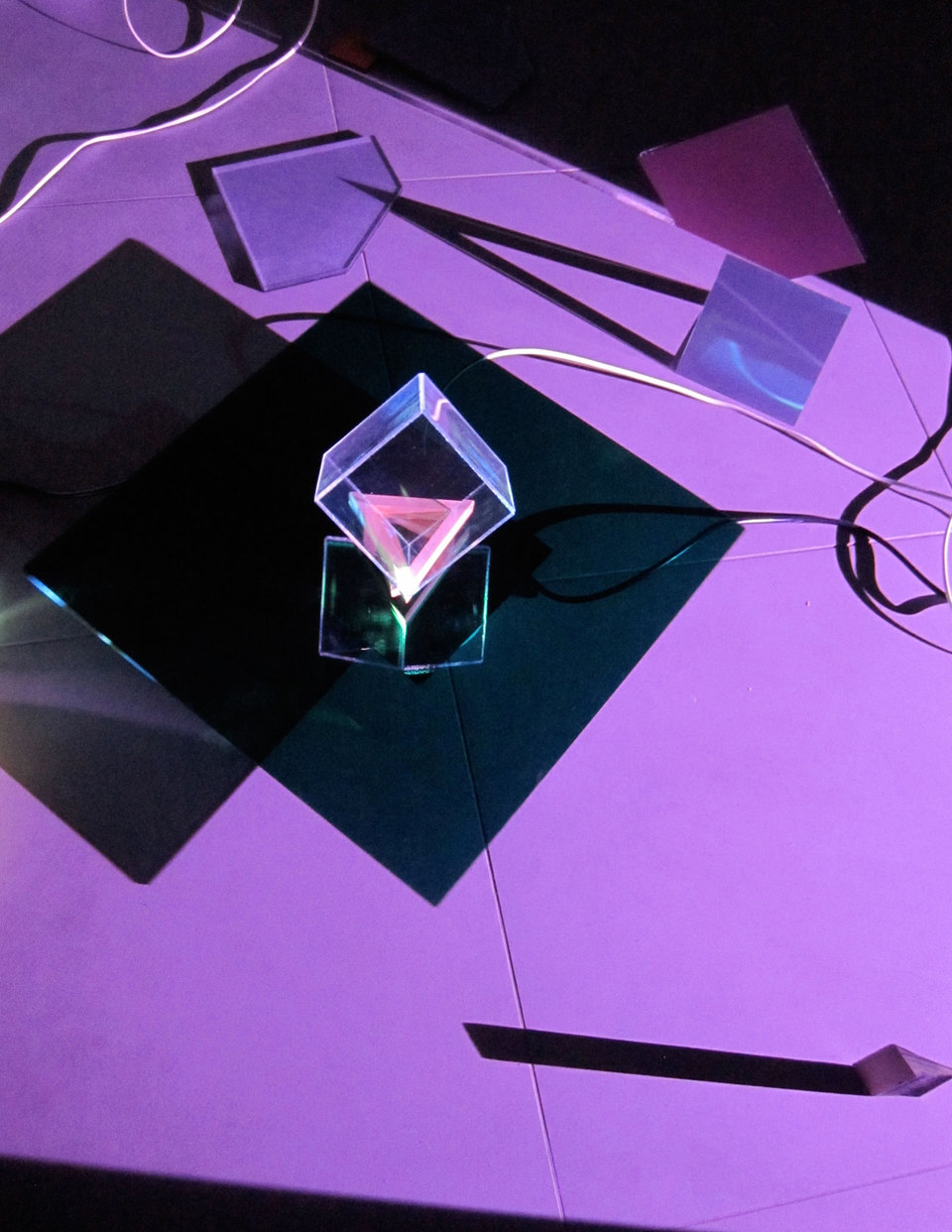 Laura Buckley, Extramundane 2010, Perspex, wood, mirror, motors, music lecterns, 3 video projections, audio (dimensions variable), Cell Project Space