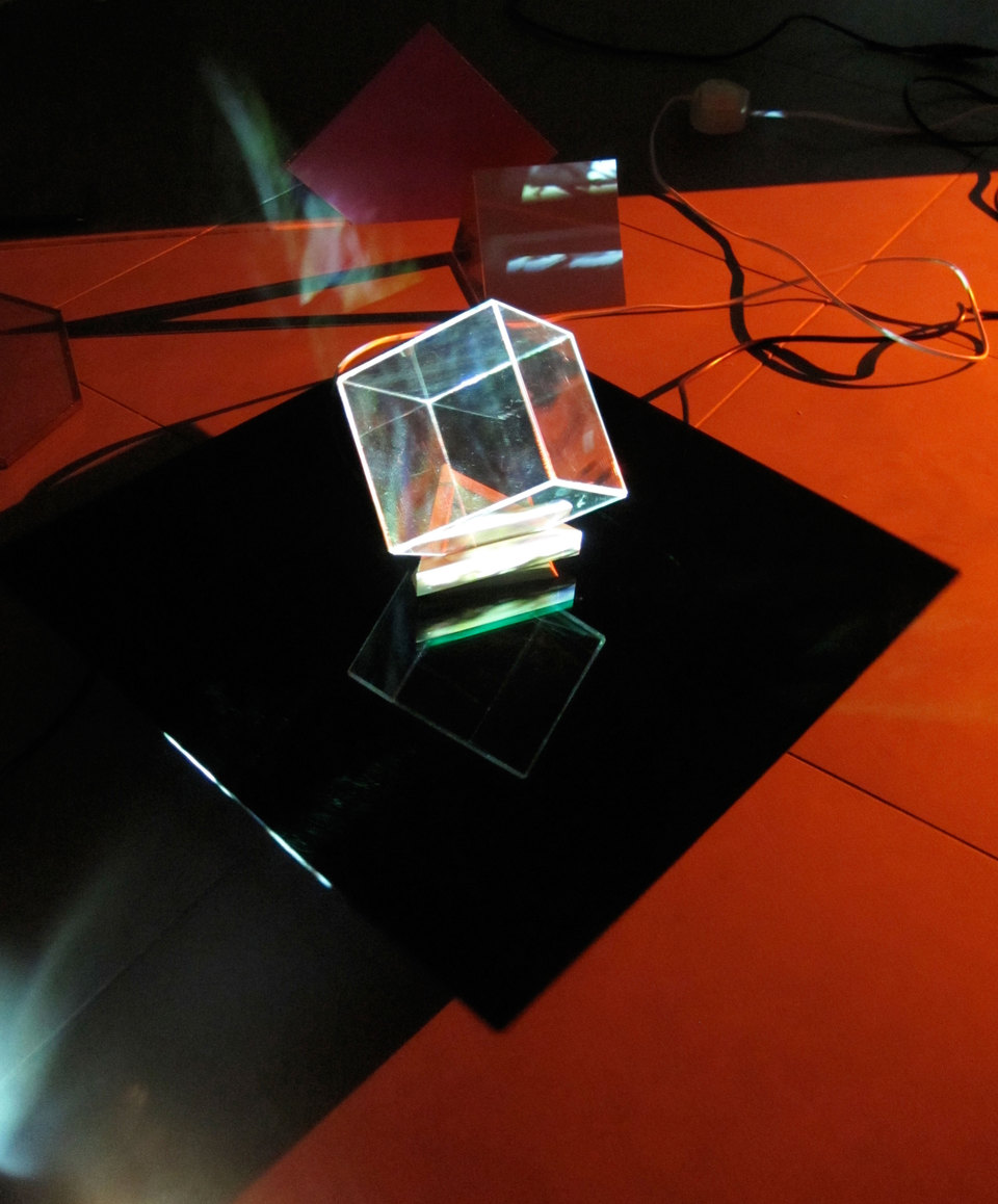 Laura Buckley, Extramundane 2010, Perspex, wood, mirror, motors, music lecterns, 3 video projections, audio (dimensions variable), Cell Project Space